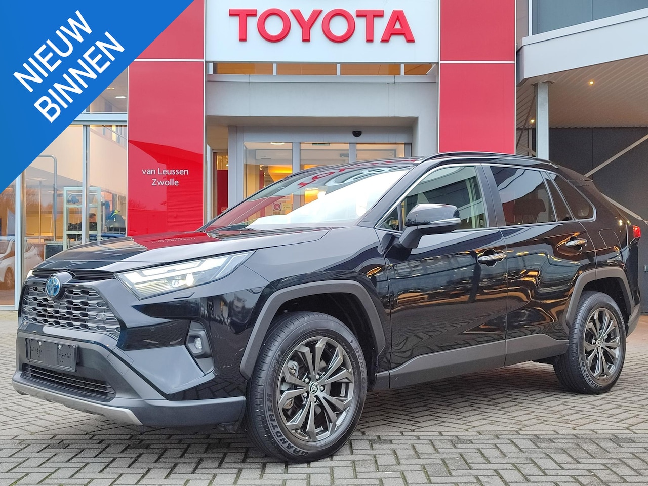 Toyota RAV4 - 2.5 Hybrid AWD Executive TREKHAAK 1650KG TREKGEW LEER NAVI STOEL/STUURVERW PARK-SENSOREN A - AutoWereld.nl