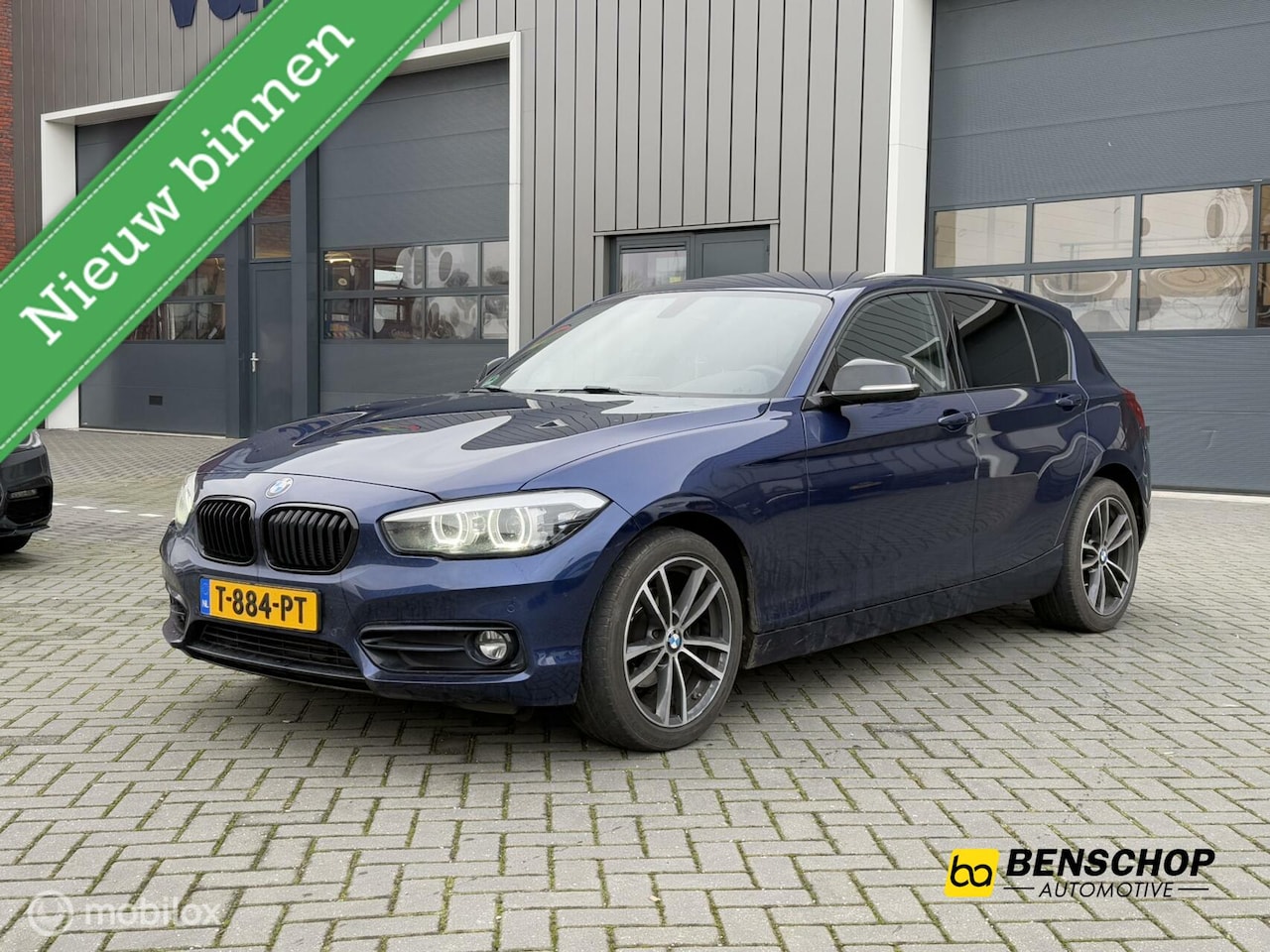 BMW 1-serie - 118i Sportline Navi Cruise Stoelv LED PDC Automaat - AutoWereld.nl