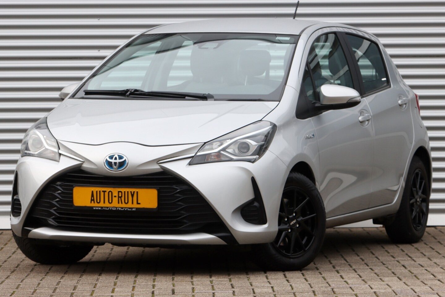 Toyota Yaris - 1.5 Hybrid Active Navi / Camera / Sportv. - AutoWereld.nl