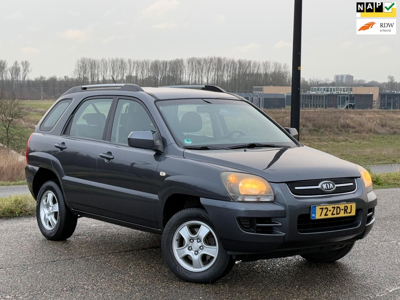 Kia Sportage - 2.0 CVVT X-pect Airco| Lmv| Radio| Nap| Boekjes - AutoWereld.nl