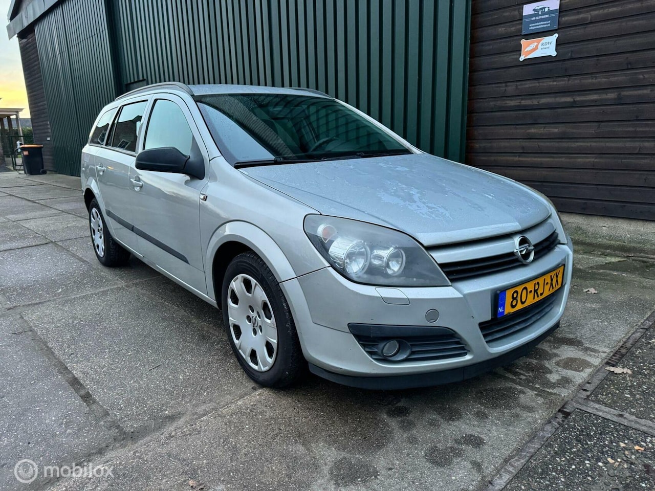 Opel Astra Wagon - 1.6 Enjoy NAP Cruise/ Airco/ Automaat! - AutoWereld.nl