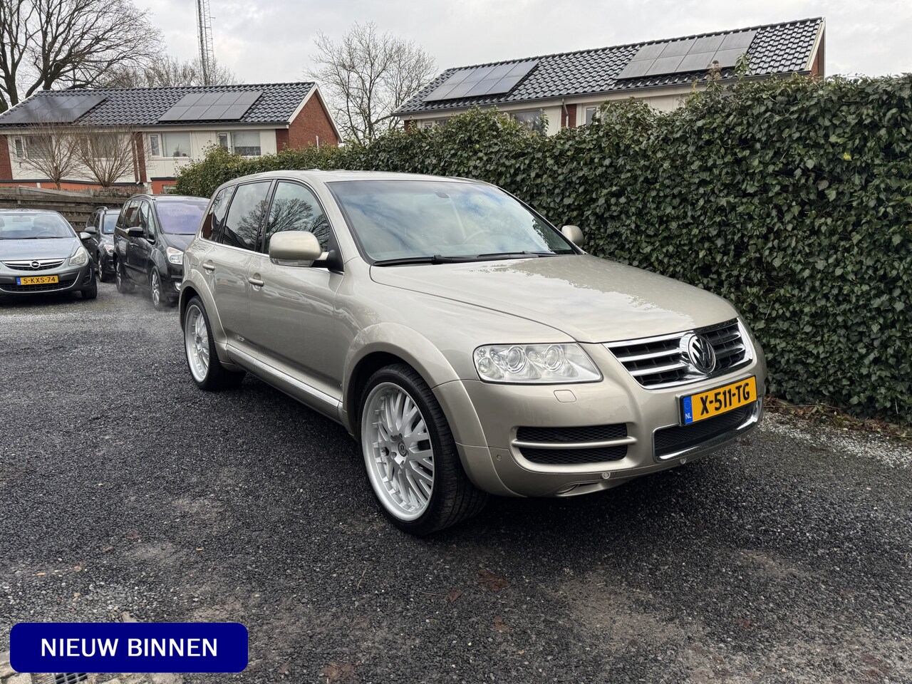 Volkswagen Touareg - 4.2 V8 Highline CARACTERE Automaat | Leer | Navi | Xenon | Luchtvering | 22" LMV | Autom. - AutoWereld.nl