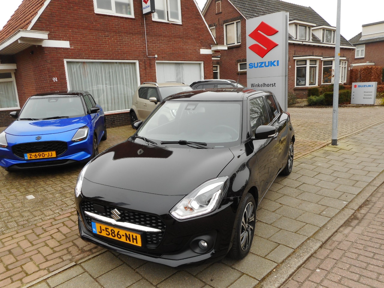 Suzuki Swift - 1.2 Style Hybrid - AutoWereld.nl