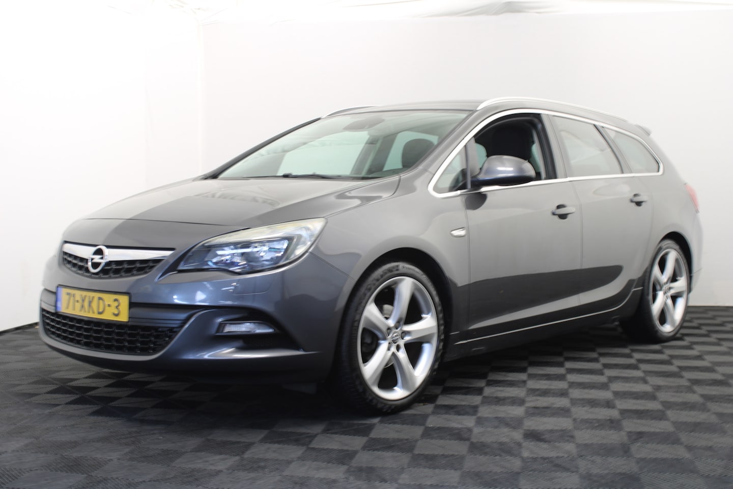 Opel Astra Sports Tourer - 1.4 Turbo Sport 1.4 Turbo Sport - AutoWereld.nl