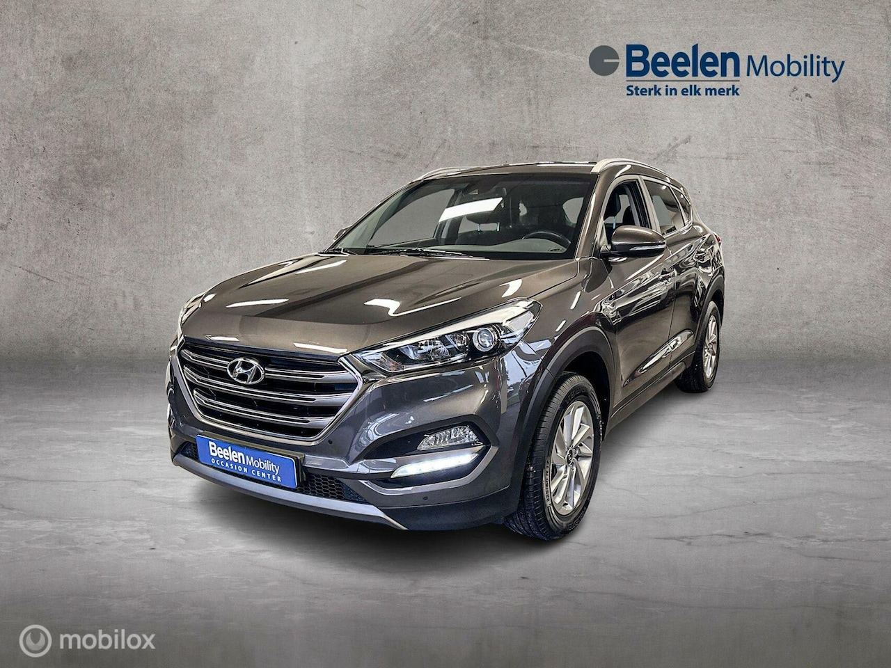 Hyundai Tucson - 1.6 Comfort|Trekhaak | Navi| Stoelverw|Camera - AutoWereld.nl