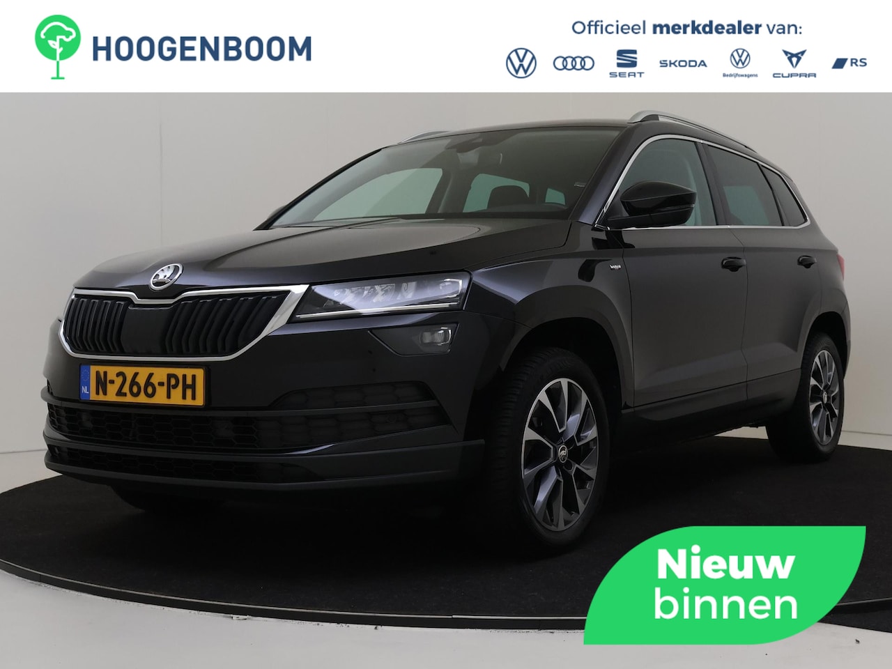 Skoda Karoq - 1.5 TSI ACT Business Edition | Stoelverwarming voor en achter | Keyless | Achteruitrijcame - AutoWereld.nl