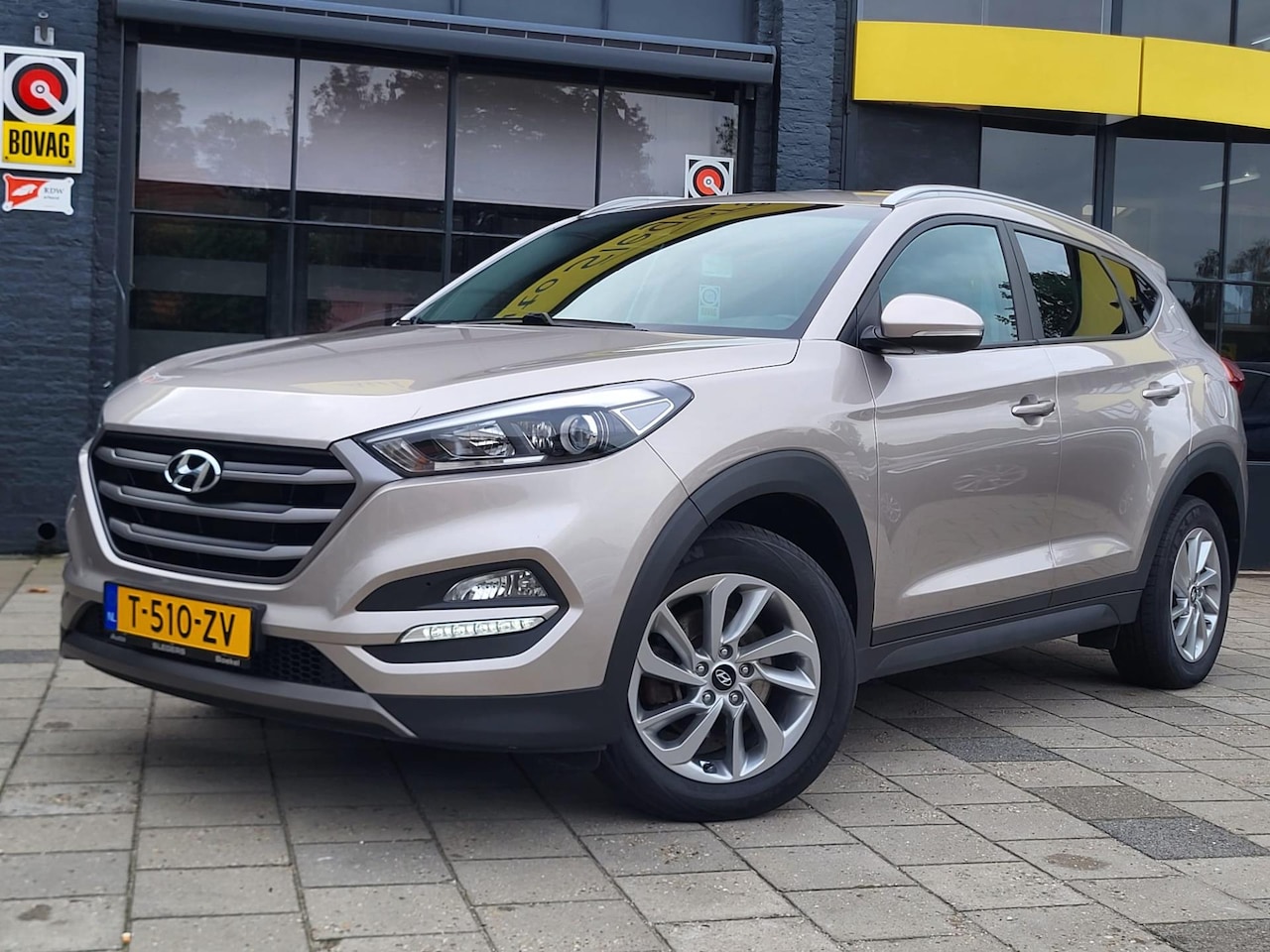 Hyundai Tucson - 1.6 T-GDi i-Motion 4WD | Park. Camera | Stoelv. | Stuurv. | Geregelde Airco | Navigatie | - AutoWereld.nl