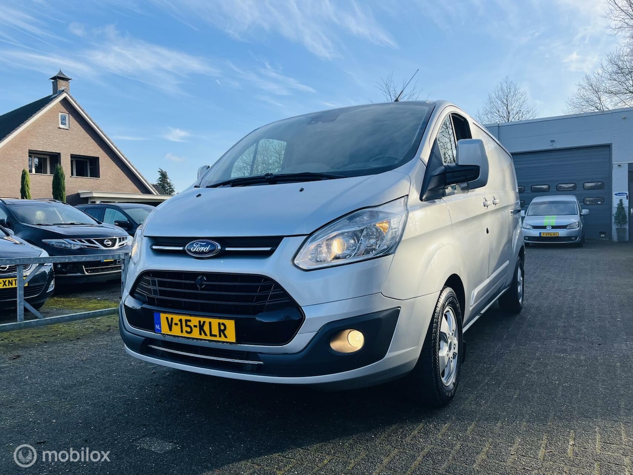 Ford Transit Custom - 340 2.0 TDCI L2H1 Limited Navi / 2x schuifdeur / Camera - AutoWereld.nl