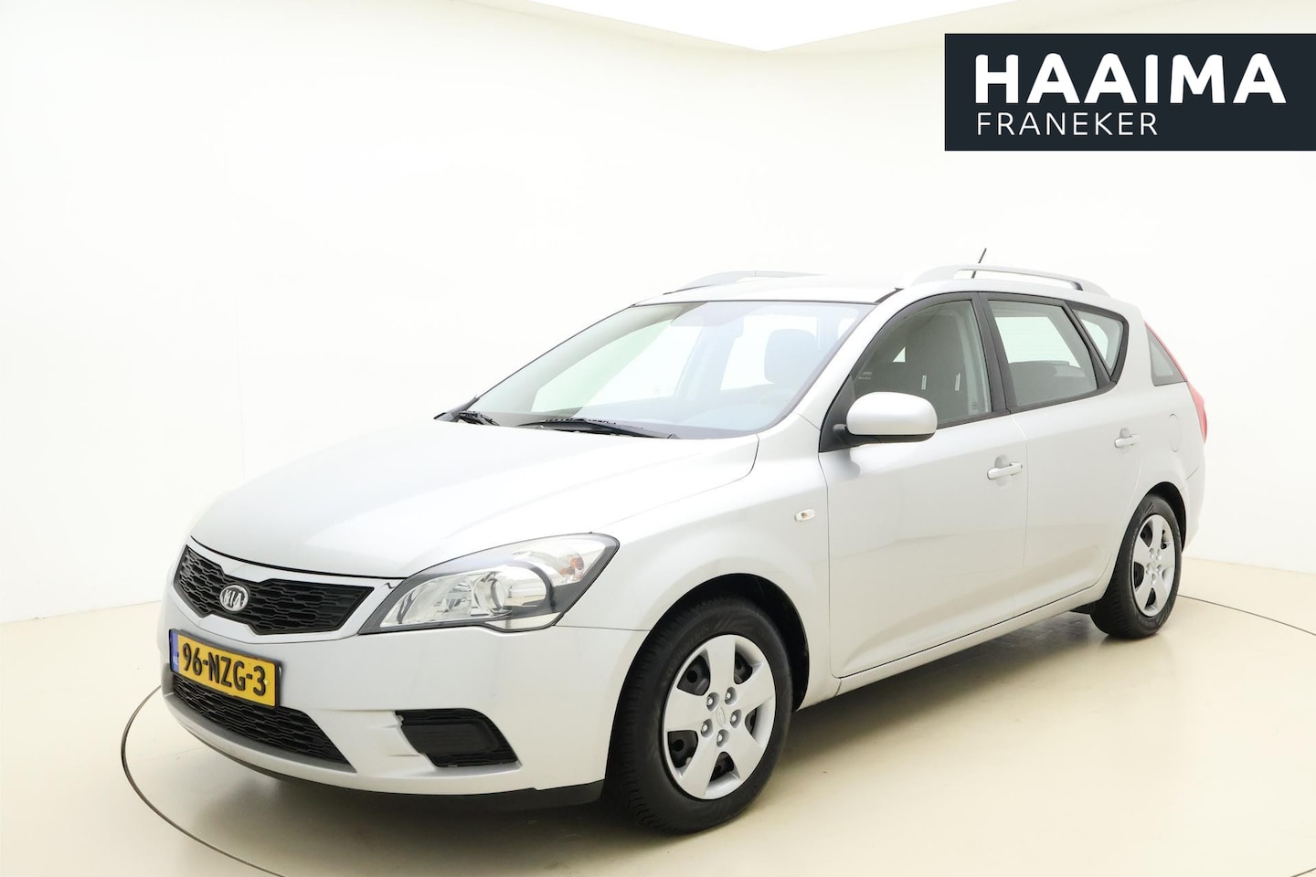 Kia Cee'd - 1.4 CVVT X-tra 90pk Airco | Cruise Control | Trekhaak | Radio-USB | Armsteun | Dakrails - AutoWereld.nl