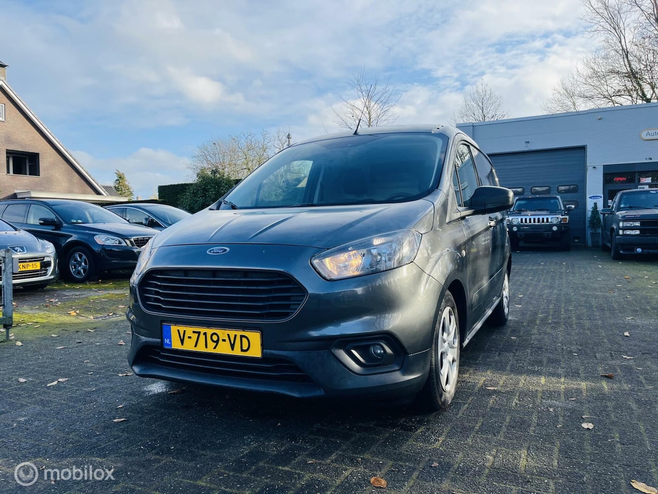 Ford Transit Courier - 1.5 TDCI Trend Start&Stop Navigatie / Bluetooth - AutoWereld.nl