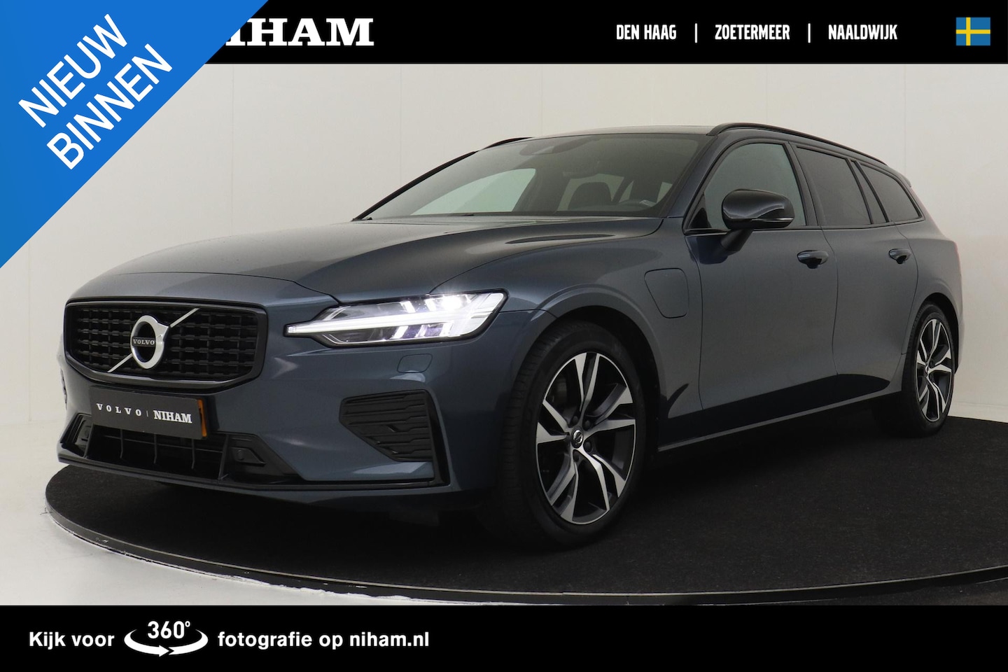 Volvo V60 - T6 RECHARGE AWD R-DESIGN -PANO.DAK|POWER-SEATS|TREKHAAK|ADAP.LED - AutoWereld.nl