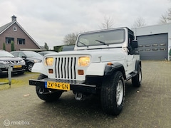 Jeep Wrangler - 4.0i 4x4 Softtop Automaat / NAP / Ned auto / APK 11-2026