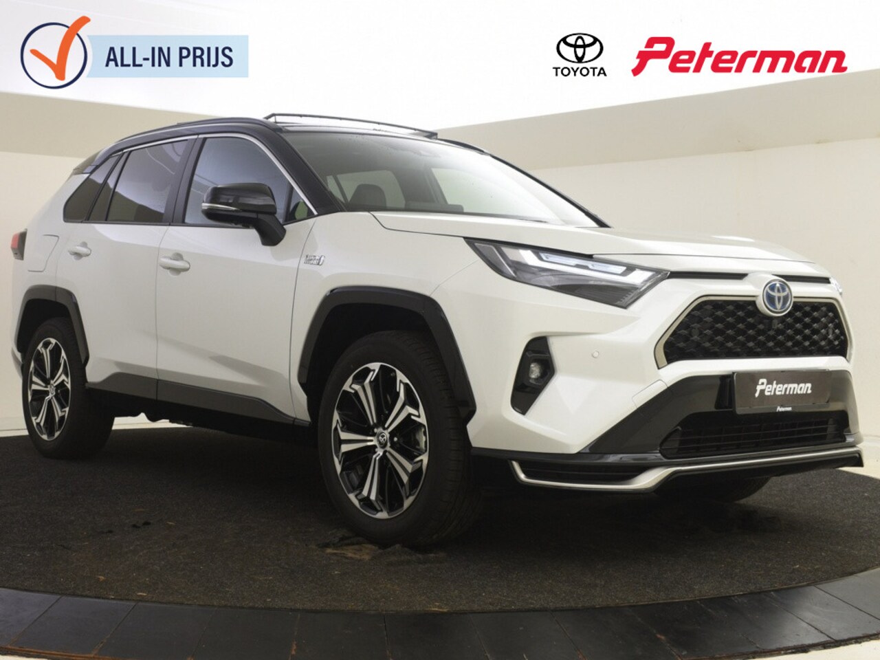 Toyota RAV4 - 2.5 Plug In Hybride Bi-Tone Plus | Panoramadak | Trekhaak - AutoWereld.nl