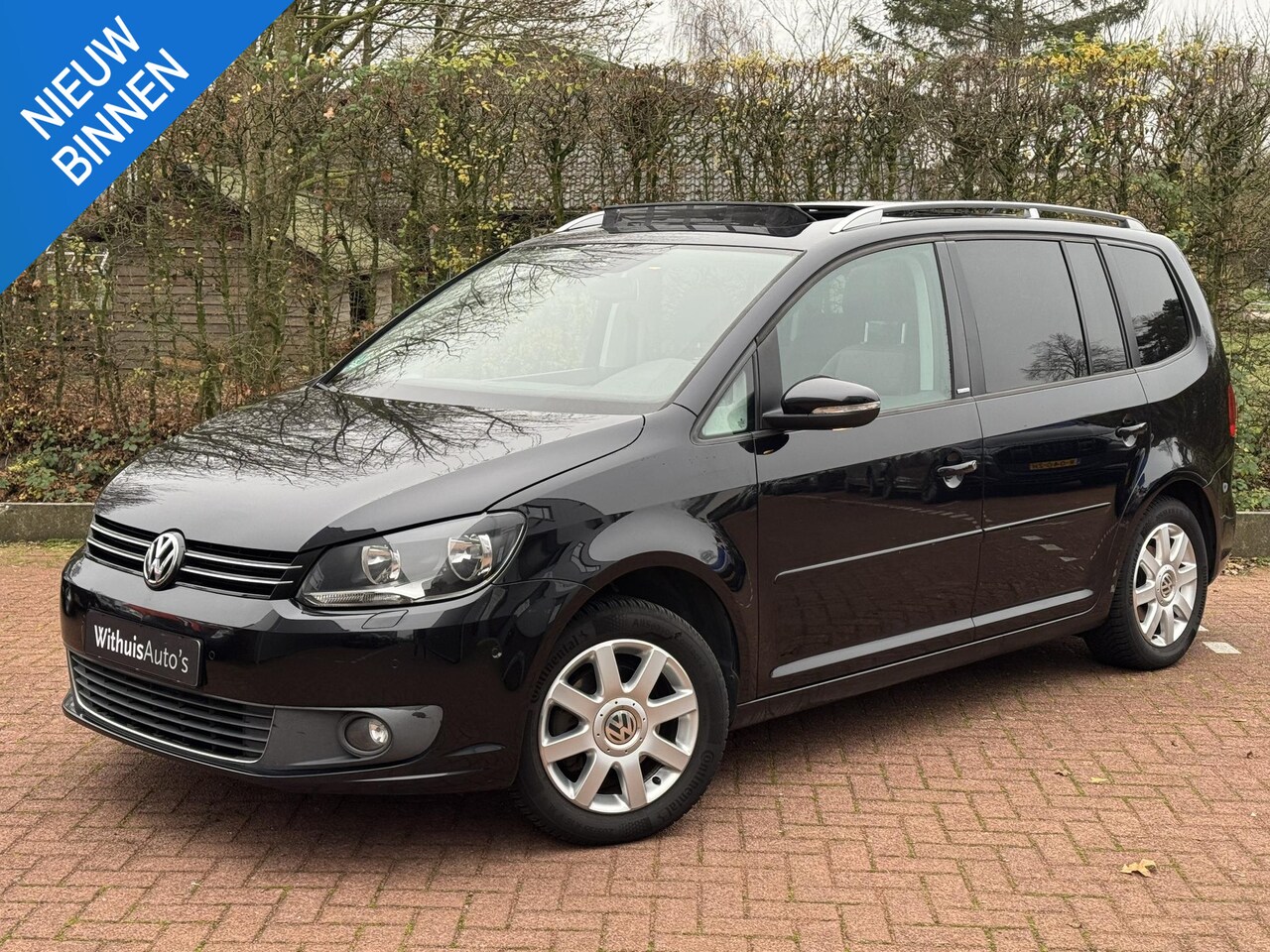 Volkswagen Touran - 1.2 TSI 105PK Highline 7-Persoons Pano Camera - AutoWereld.nl