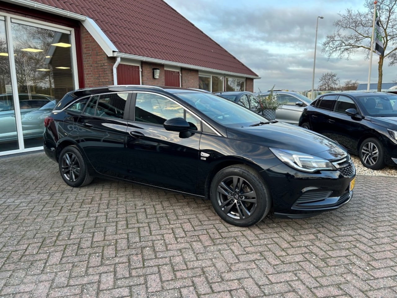 Opel Astra Wagon - 1.0 TURBO 120 JAAR EDITION WAGON TREKHAAK/NAVI/CRUISE/ENZ. - AutoWereld.nl