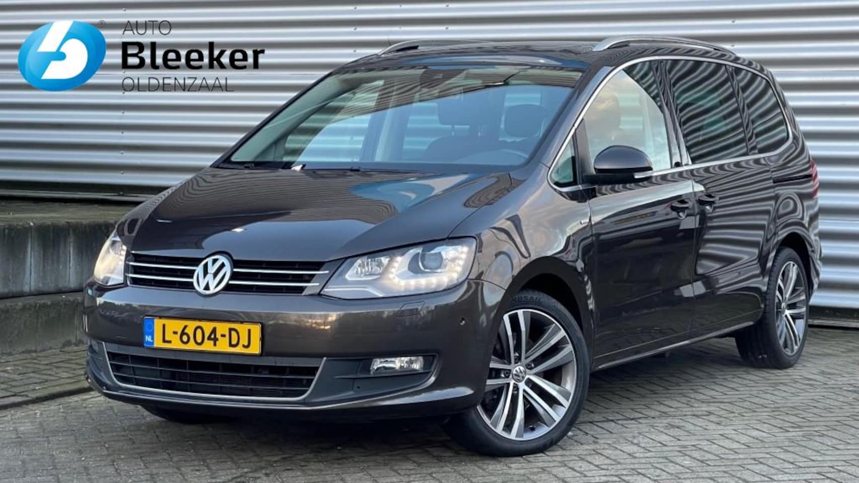 Volkswagen Sharan - 1.4 TSI ComfortLine 7 pers Airco Navi Pano Cruise Stoelverwar - AutoWereld.nl