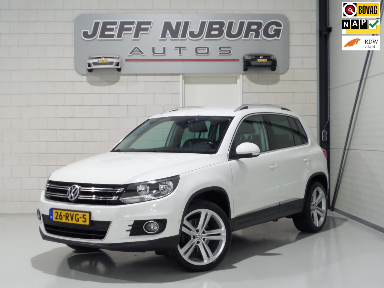 Volkswagen Tiguan - 1.4 TSI Sport&Style "Origineel NL!" Trekhaak Leer 19"Velgen Stoelverwarming Bluetooth Navi - AutoWereld.nl