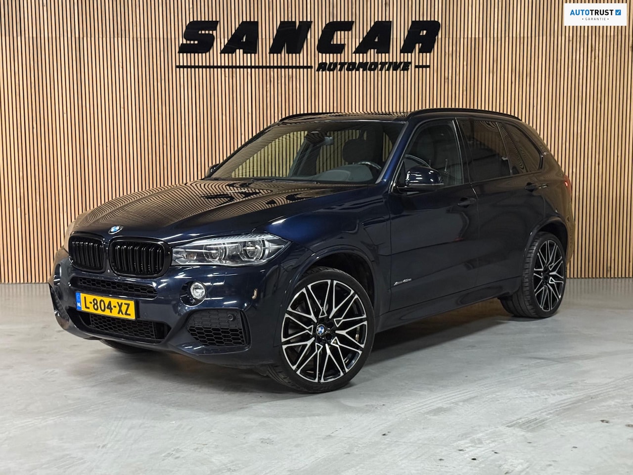 BMW X5 - XDrive40e iPerformance High Executive M sport PANO|HEADUP|H&K|TREKHAAK|LUCHTVERING|22INCH - AutoWereld.nl