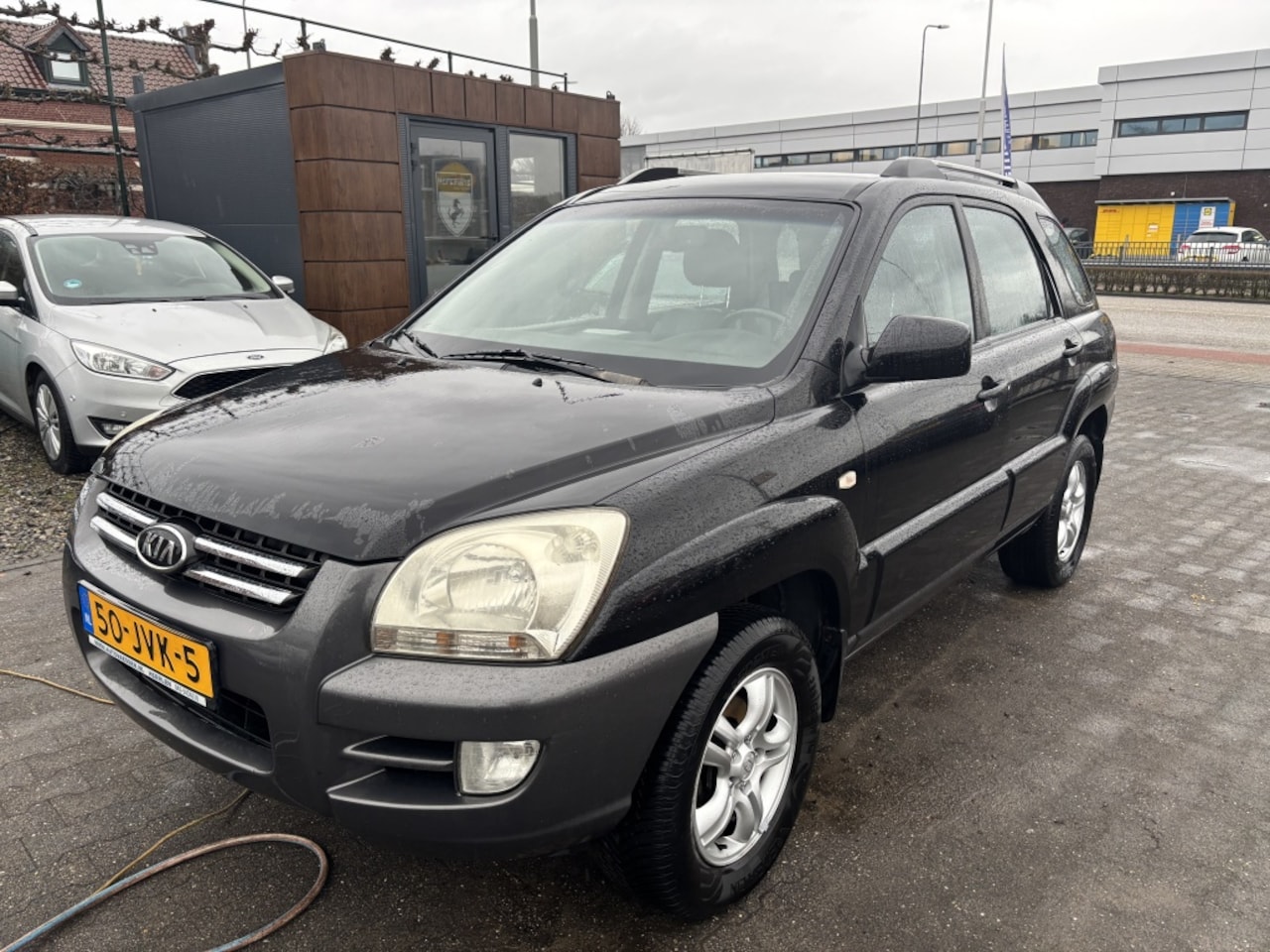 Kia Sportage - 2.0 CVVT Comfort 2.0 CVVT Comfort - AutoWereld.nl