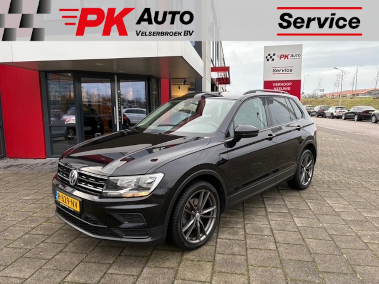 Volkswagen Tiguan - 1.4 TSI ACT Comfortline Business | Navi | Cruise | 84.447 km Dealeronderhouden - AutoWereld.nl