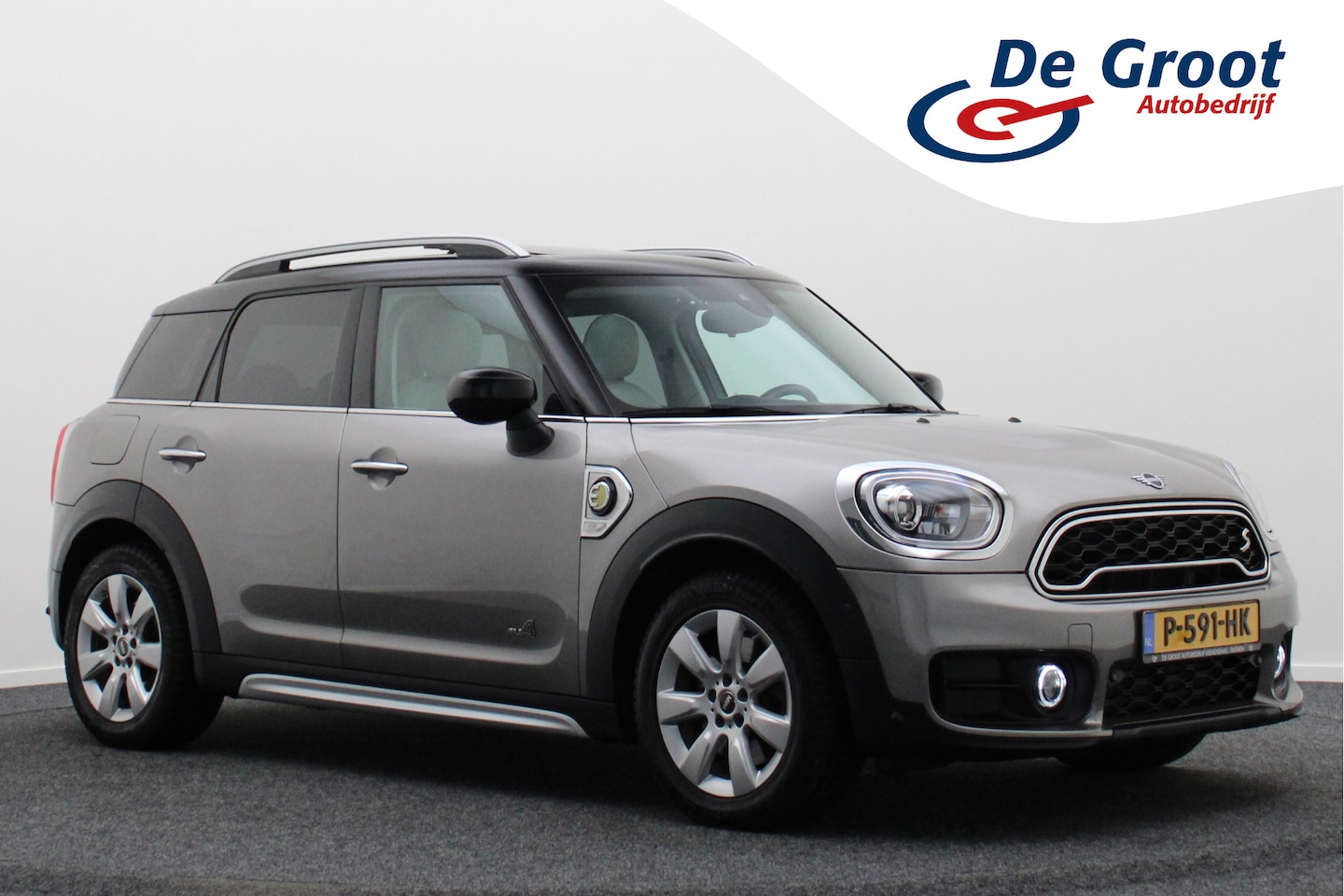 MINI Countryman - Mini 2.0 Cooper S E ALL4 Chili Leer, Panoramadak, Apple Carplay, Cruise, Navigatie, Blueto - AutoWereld.nl