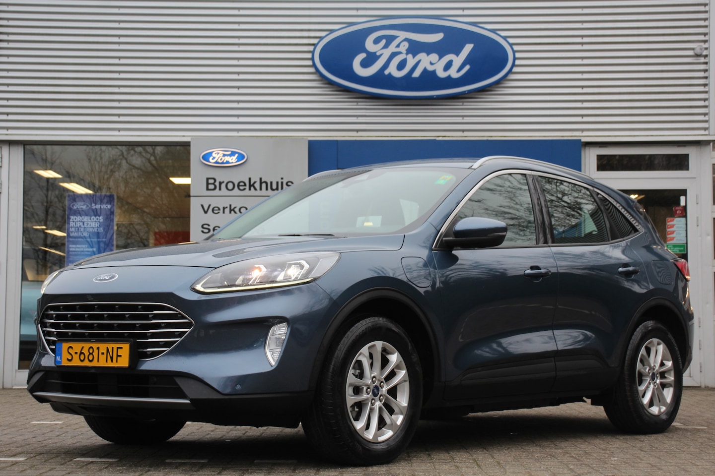 Ford Kuga - 2.5 PHEV TITANIUM | NL-AUTO! | TREKHAAK ELEKTRISCH | 1e EIGENAAR! | DEALER OH! | HEAD-UP D - AutoWereld.nl