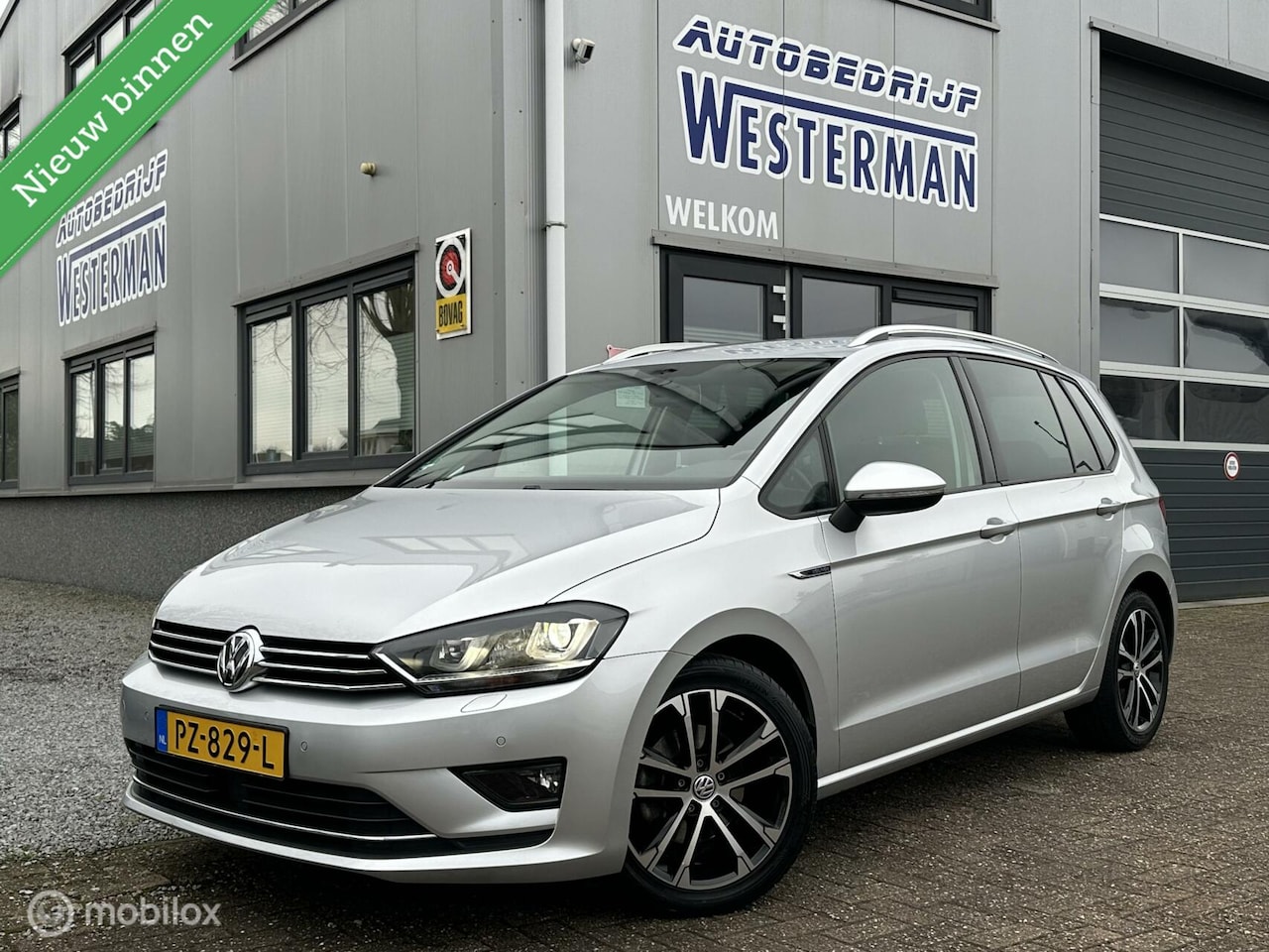 Volkswagen Golf Sportsvan - 1.4 TSI Lounge Navi Xenon Cruise Clima Trekhaak etc. - AutoWereld.nl