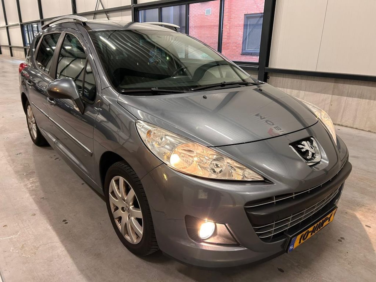 Peugeot 207 SW - 1.6 VTi Sportium 2010 NAP Airco APK - AutoWereld.nl