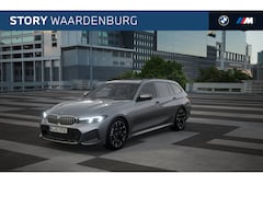 BMW 3-serie Touring - 330e High Executive M Sport Automaat / Panoramadak / Trekhaak / Sportstoelen / Stoelverwar