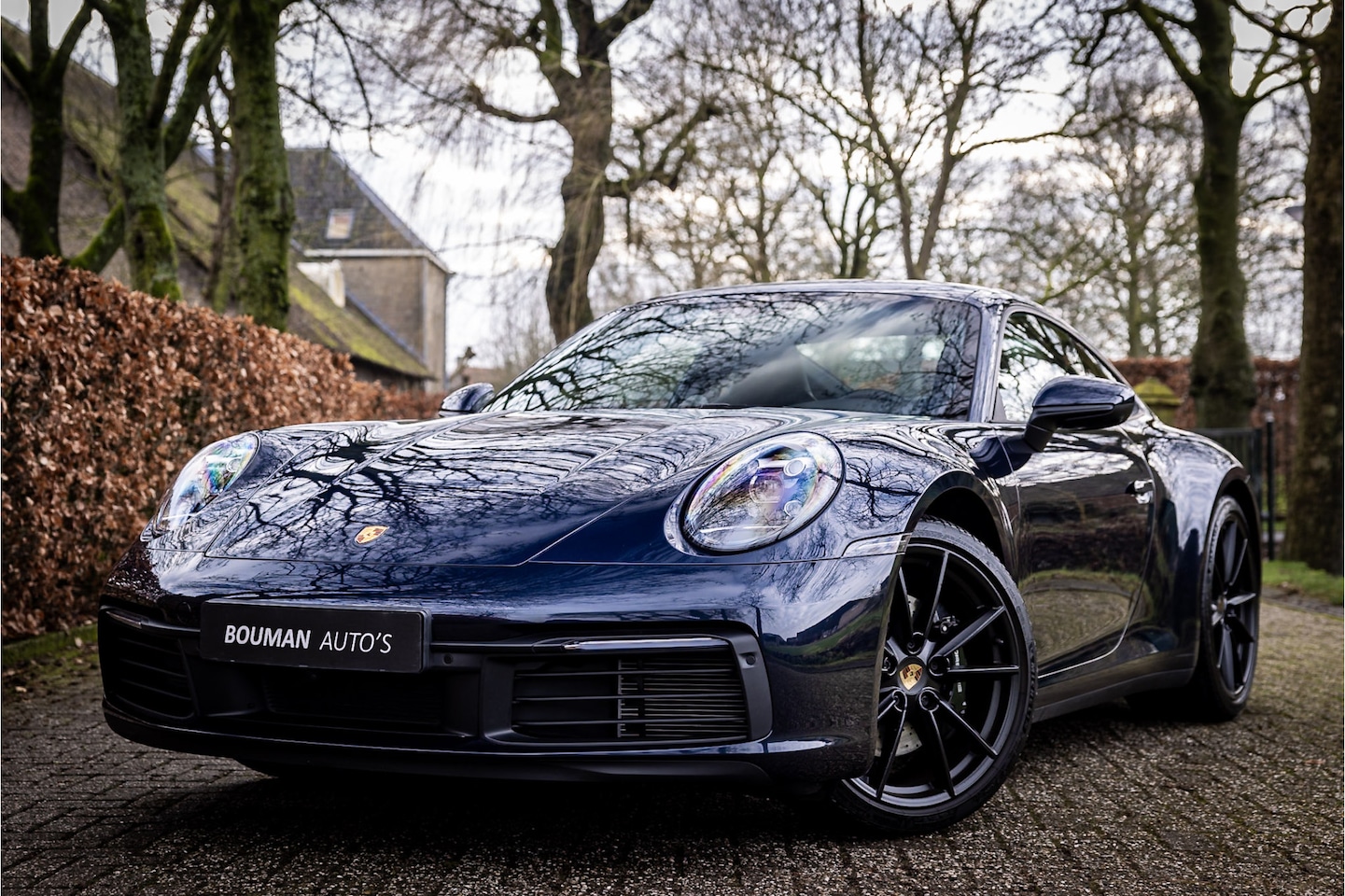 Porsche 911 - 3.0 Carrera 4 S Nachtblau Handbak Achterasbesturing Sport Chrono Schuifdak - AutoWereld.nl