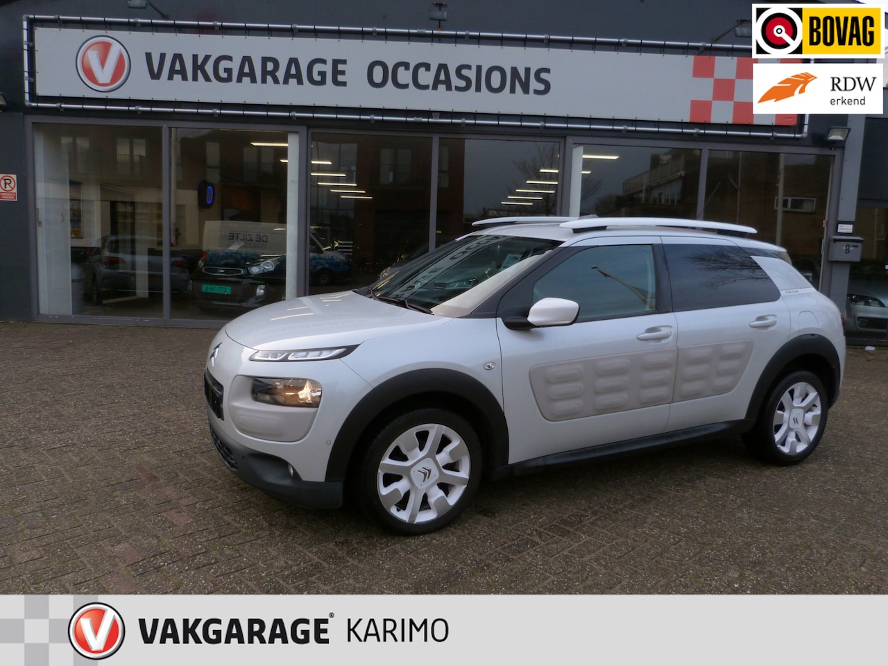 Citroën C4 Cactus - 1.2 PureTech Business Plus Parelmoer wit,navi,camera. - AutoWereld.nl