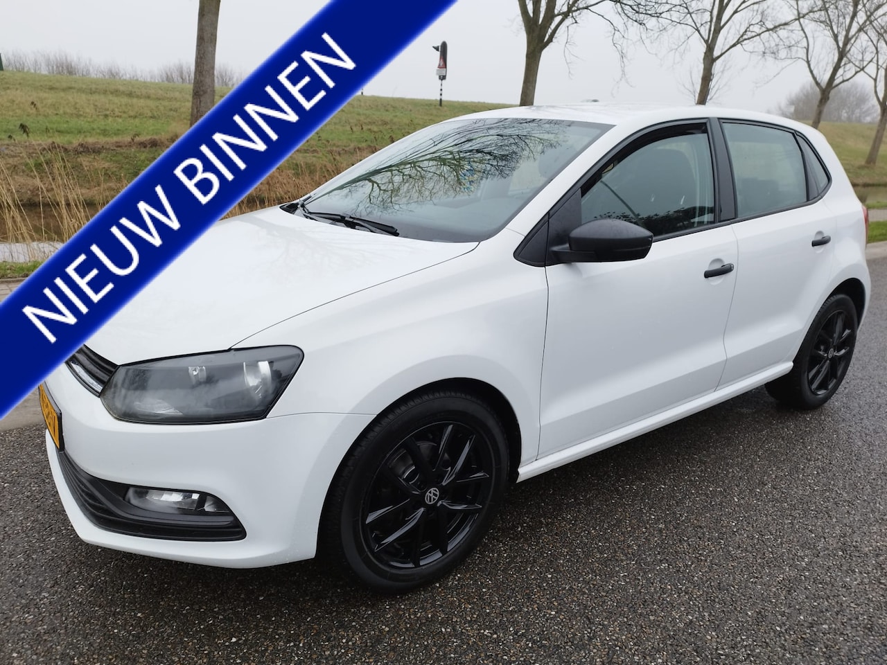 Volkswagen Polo - 1.0 Comfortline ** 5 DRS ** NAVI ** Bluetooth ** 16 inch LM velgen ** Lederen MF stuurwiel - AutoWereld.nl