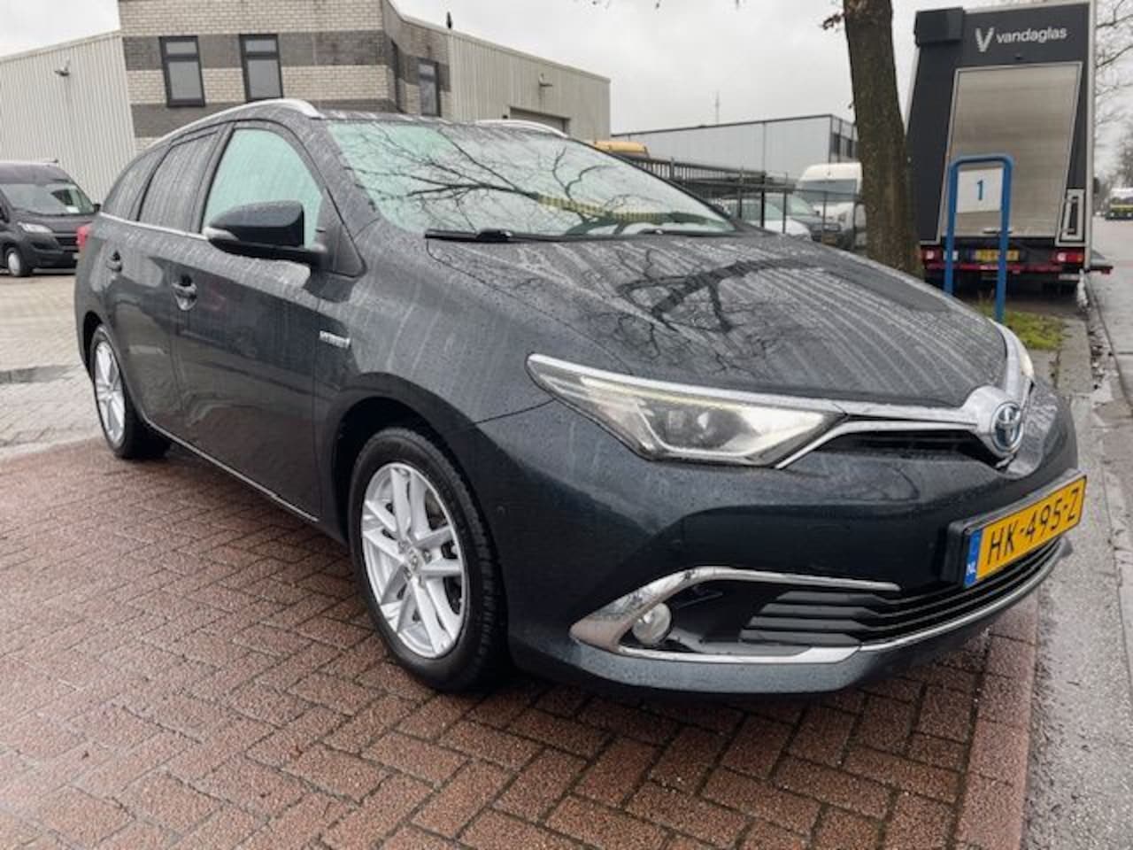 Toyota Auris Touring Sports - 1.8 Hybrid Lease pro Airco/ECC,Navi,Camera,Panoramadak Zeer Nette Auto - AutoWereld.nl