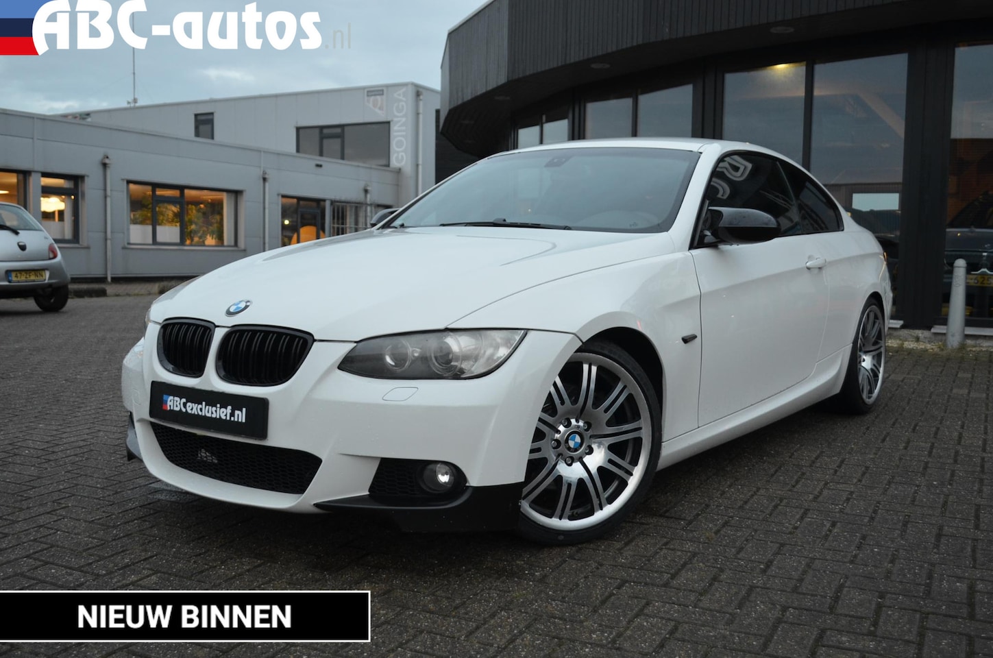 BMW 3-serie Coupé - 330xi High Exe M-Sport / Handbak - AutoWereld.nl