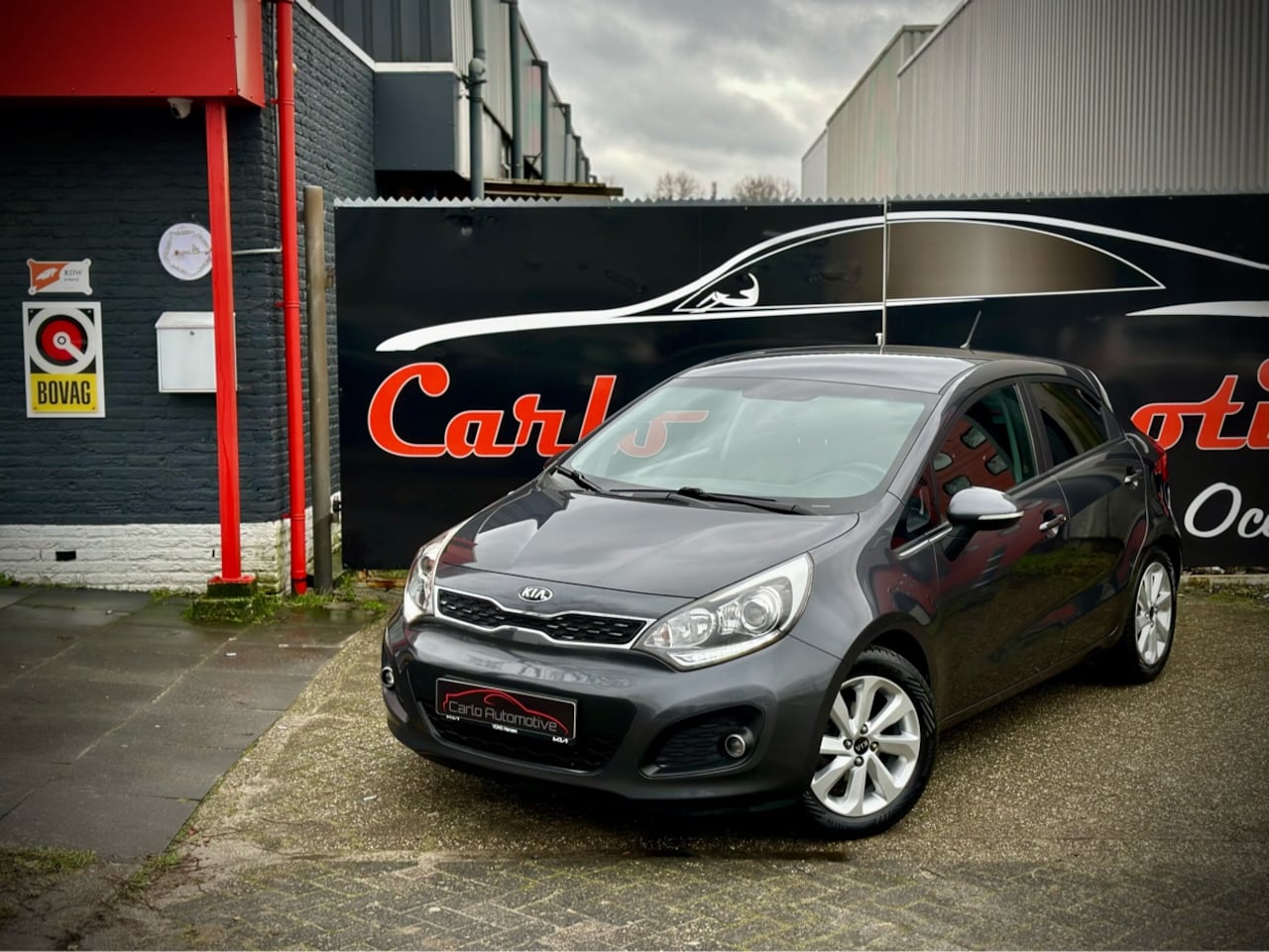 Kia Rio - 1.2 CVVT SuperPack NAVI|CLIMA|CRUISE|KEYLESS|PDC - AutoWereld.nl