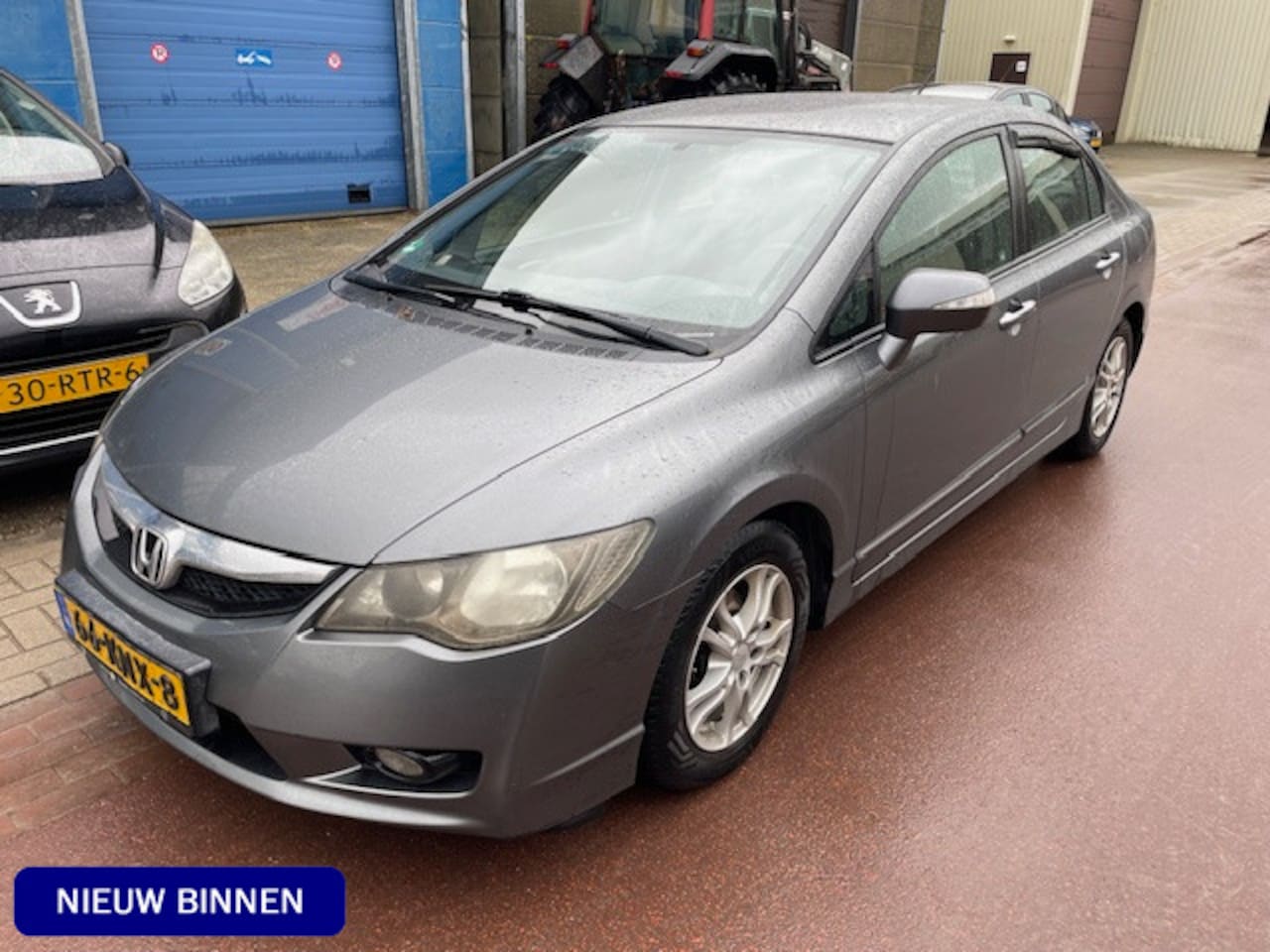 Honda Civic - 1.3 Hybrid Comfort 2010 LMV met All Season banden Prima en zuinige auto met leuke opties. - AutoWereld.nl