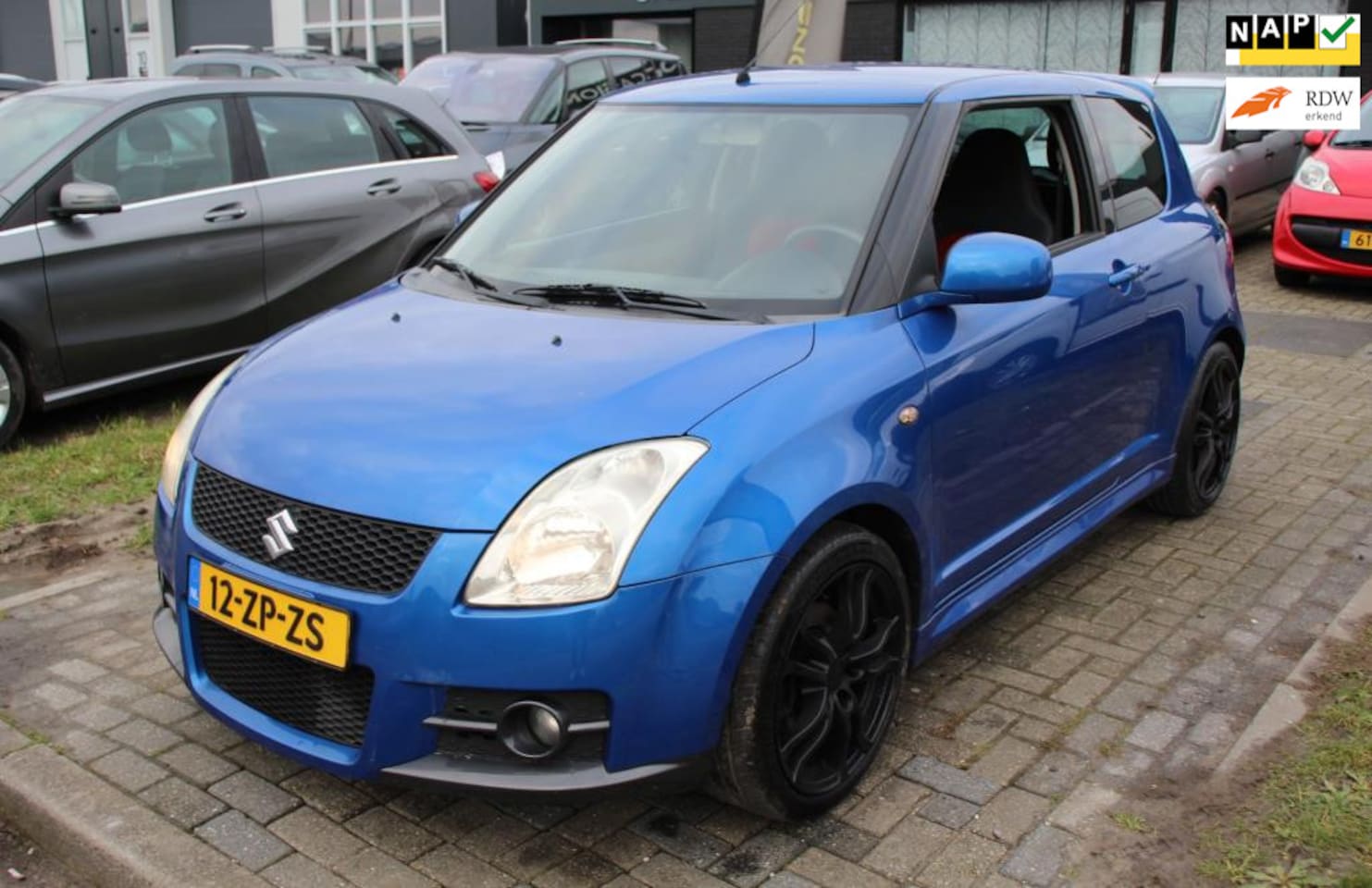 Suzuki Swift - 1.6 Sport 125PK Climate NAV 17" LMV Dubbele uitlaat NAP APK - AutoWereld.nl