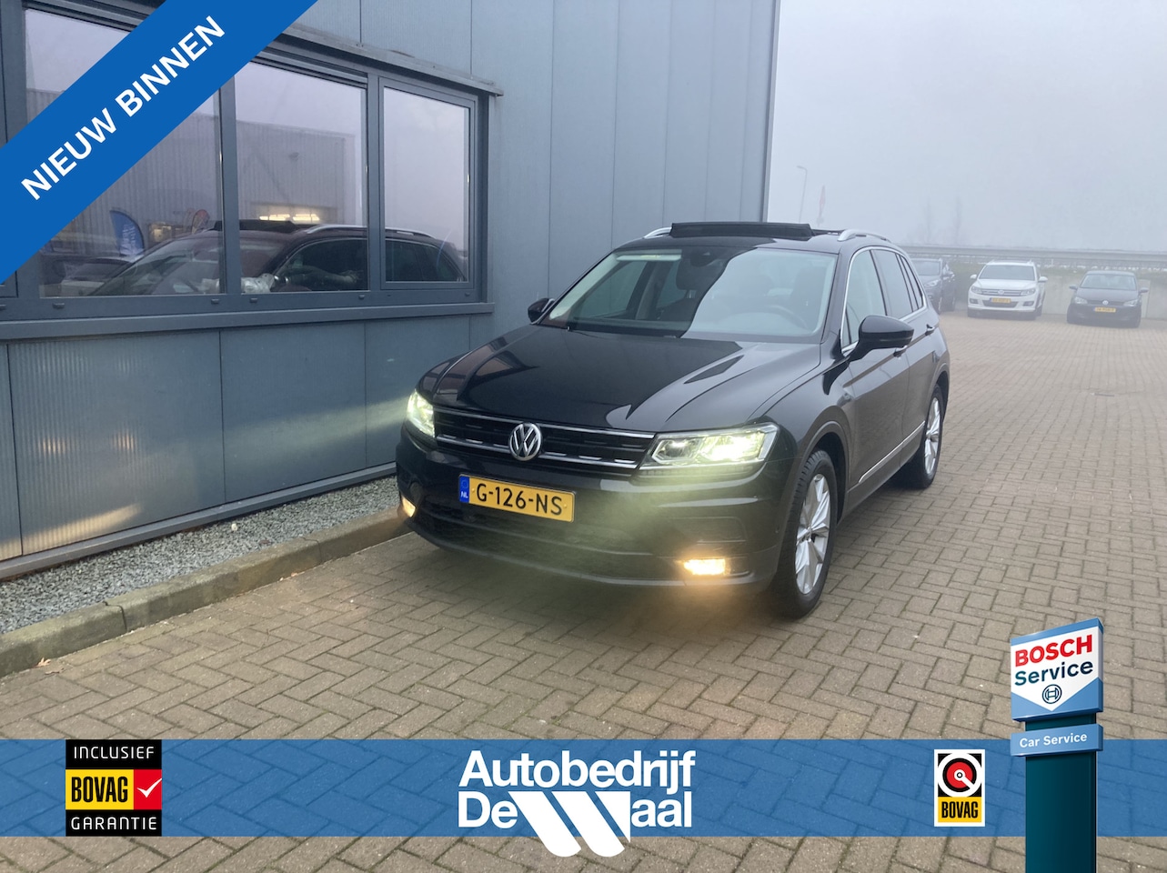 Volkswagen Tiguan - 1.5 TSi 110KW DSG Business SCHUIFDAK/CAMERA/KEYLESS/VIRTUAL/STOELVERWARMING - AutoWereld.nl