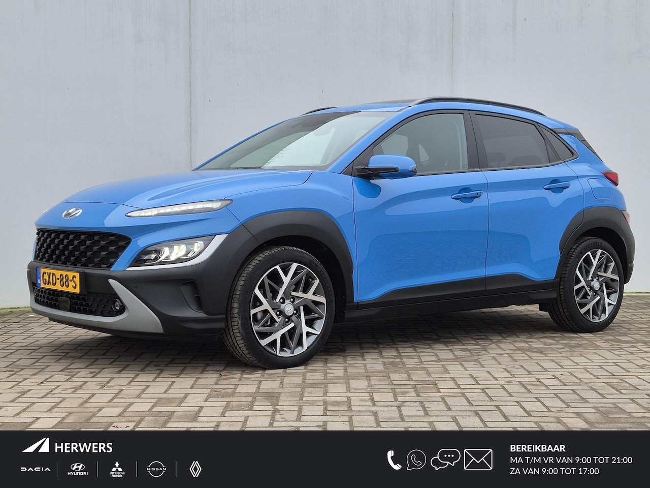 Hyundai Kona - 1.6 GDI HEV Premium Sky Automaat / HUD / Apple Carplay Android Auto / Stuur- en stoelverwa - AutoWereld.nl