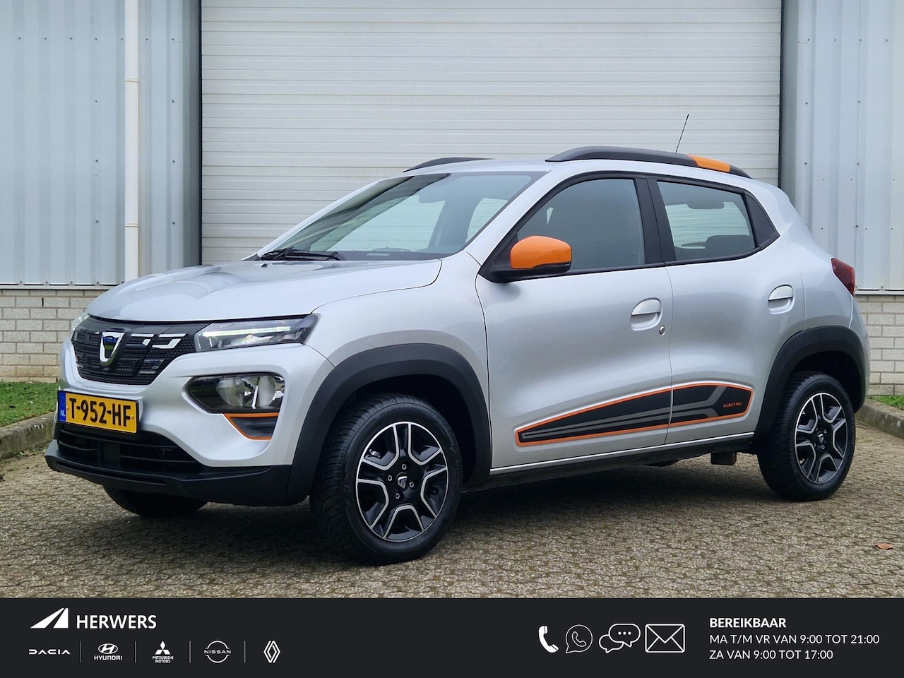 Dacia Spring - Comfort Plus (Orange Pack) 27 kWh / Snel Laden / Achteruitrijcamera / Navigatie / Parkeers - AutoWereld.nl