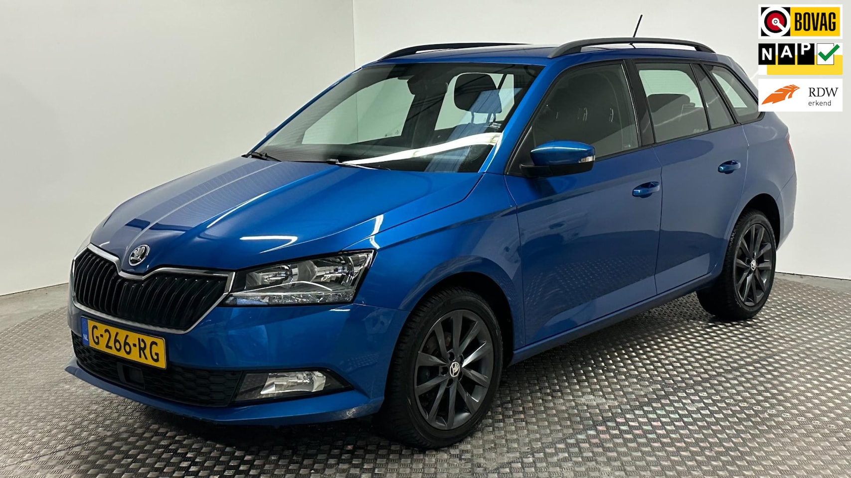 Skoda Fabia Combi - 1.0 TSI Business Edition benzine navigatie stoelverwarming parkeersensoren cruisecontrole - AutoWereld.nl