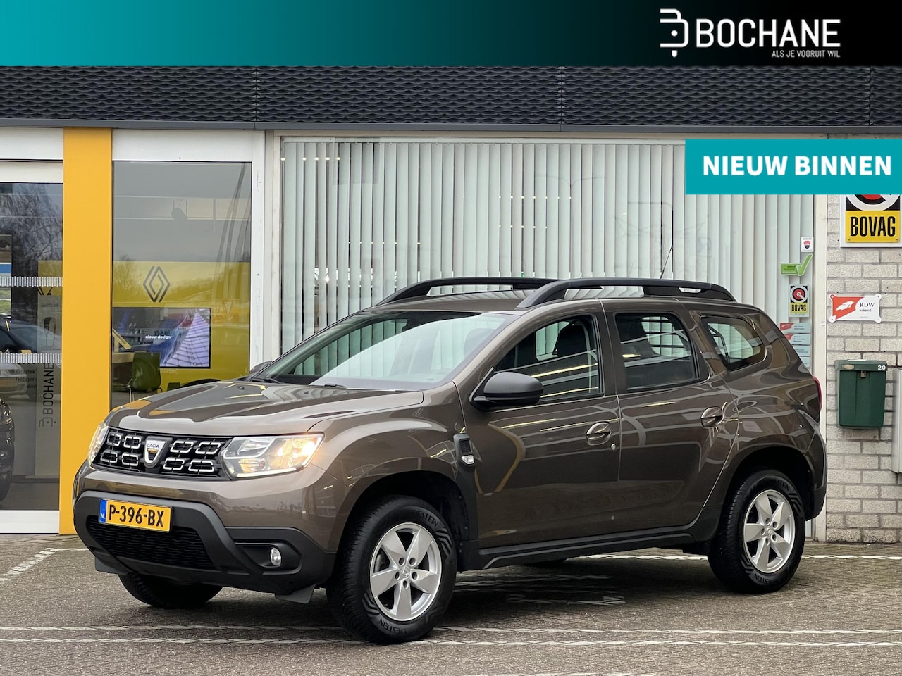 Dacia Duster - 1.0 TCe Comfort | Trekhaak | Stoelverwarming | Parkeersensoren | Airco | Lichtmetaal | Cru - AutoWereld.nl