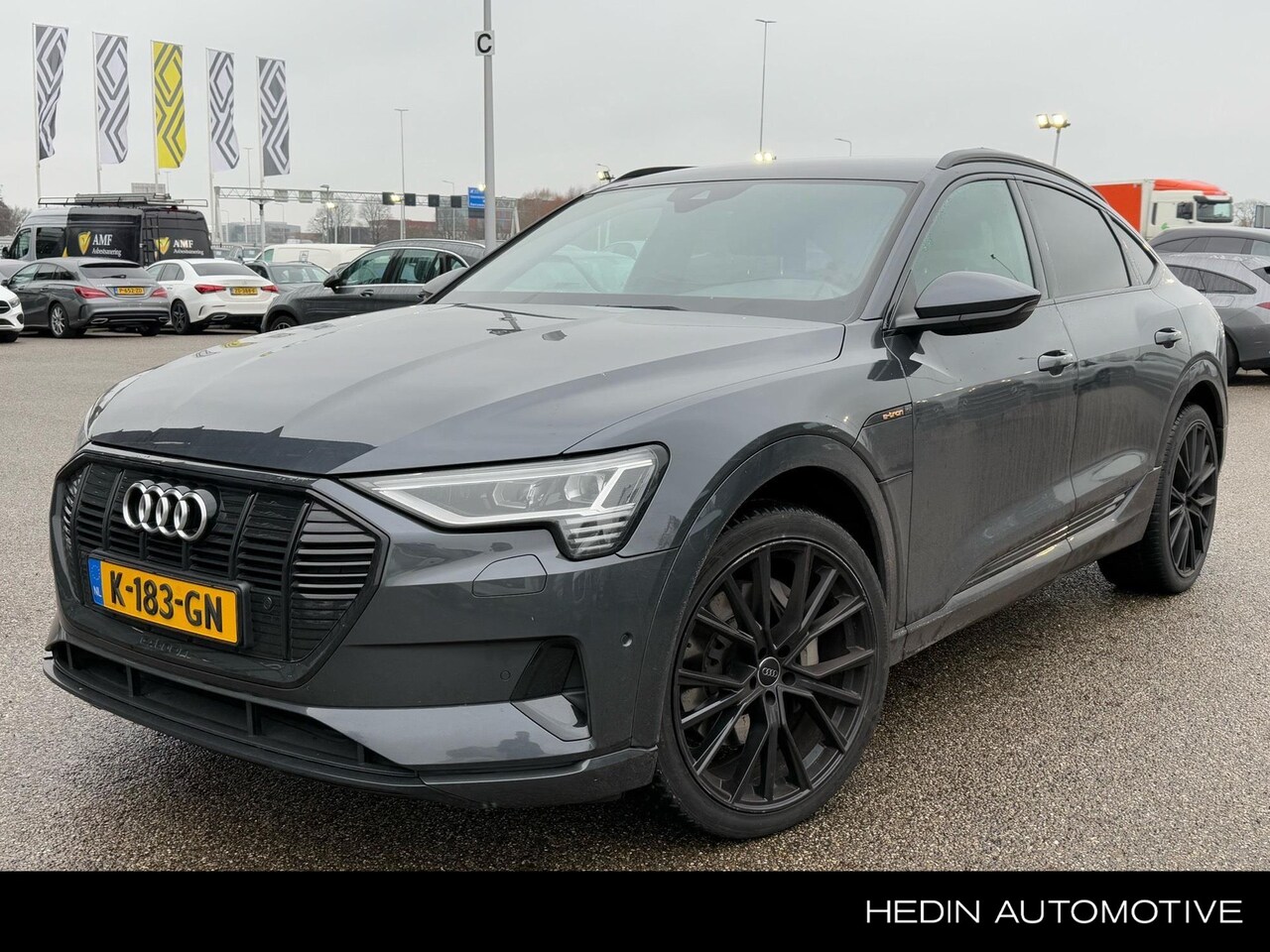 Audi e-tron Sportback - 55 Quattro Business Edition | Trekhaak | Luchtvering | Standkachel | Stoelverwarming | LED - AutoWereld.nl