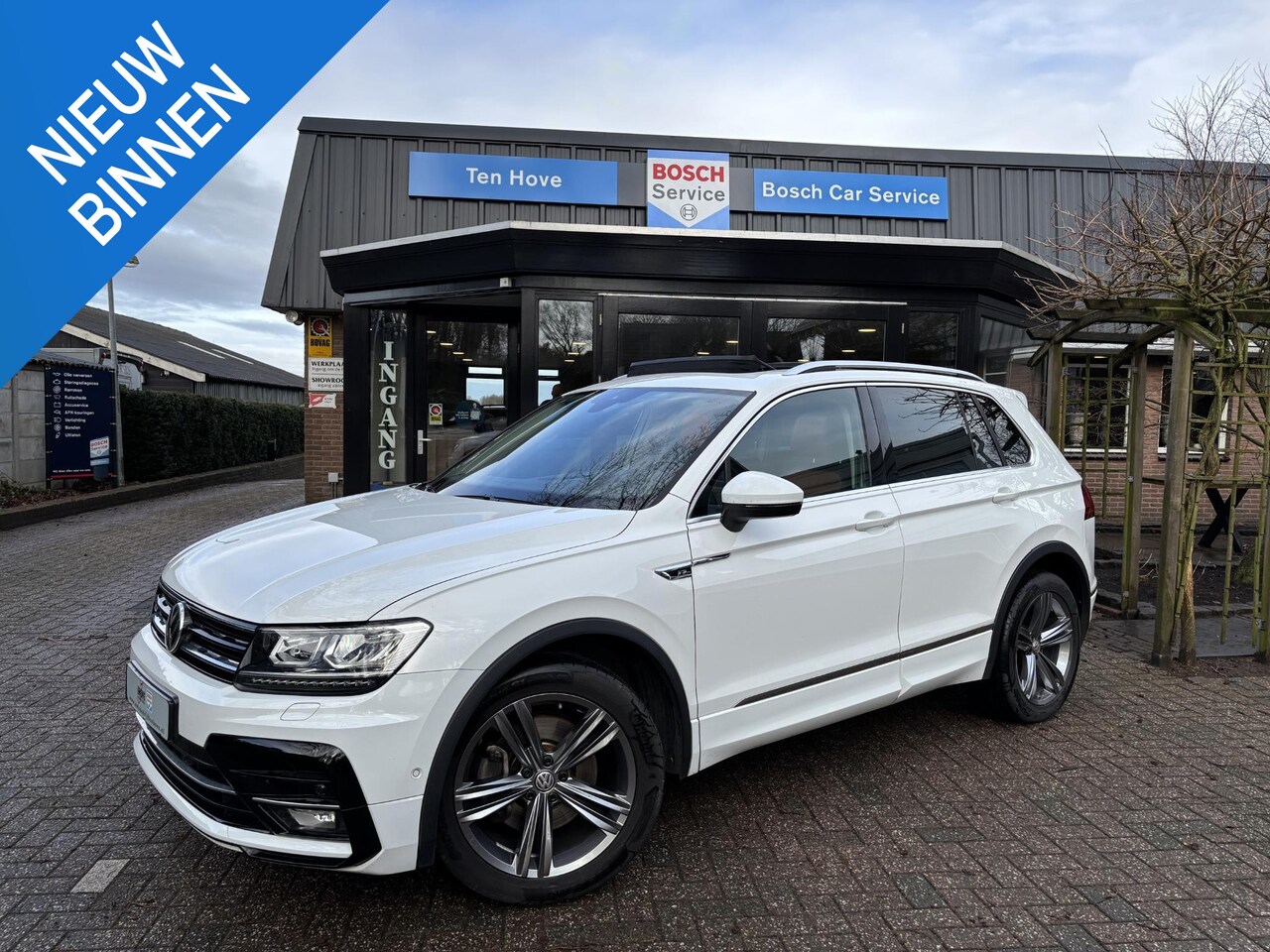 Volkswagen Tiguan - 2.0 TSI DSG 4Motion R-line Leder Pano Camera - AutoWereld.nl