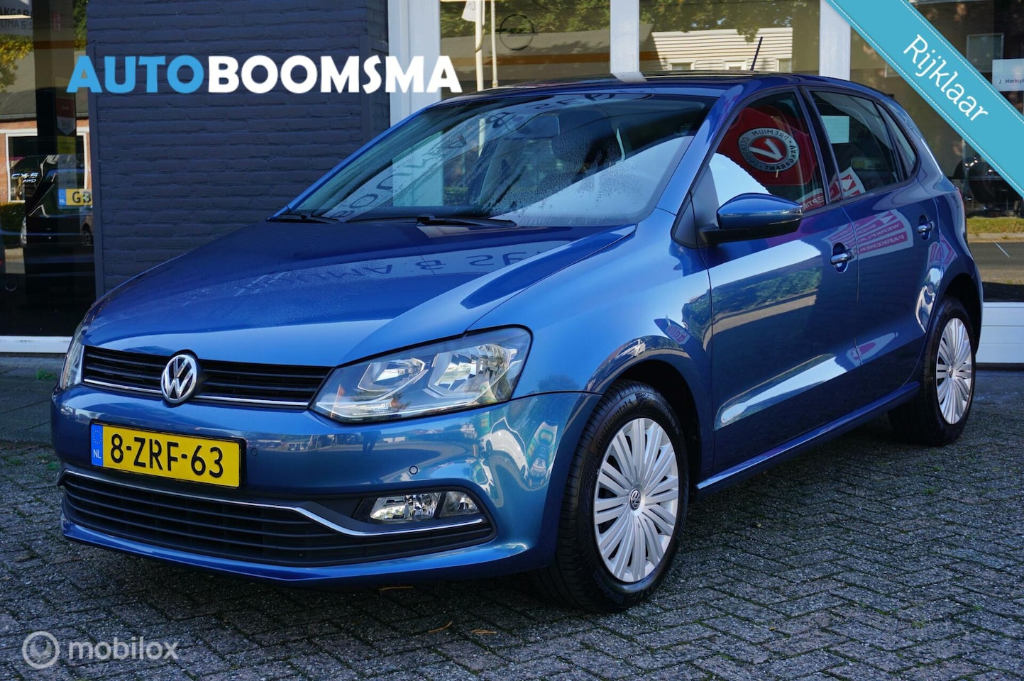 Volkswagen Polo - 1.4 TDI 90pk Comfortline Airco Cruise Navi 2xPDC - AutoWereld.nl