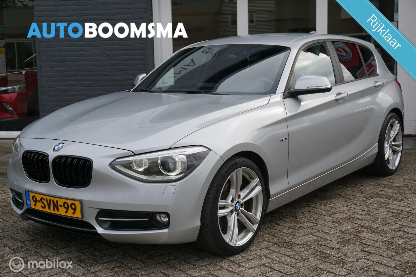 BMW 1-serie - 114i 5drs Sport Navi Clima Cruise 18"Velgen Xenon - AutoWereld.nl