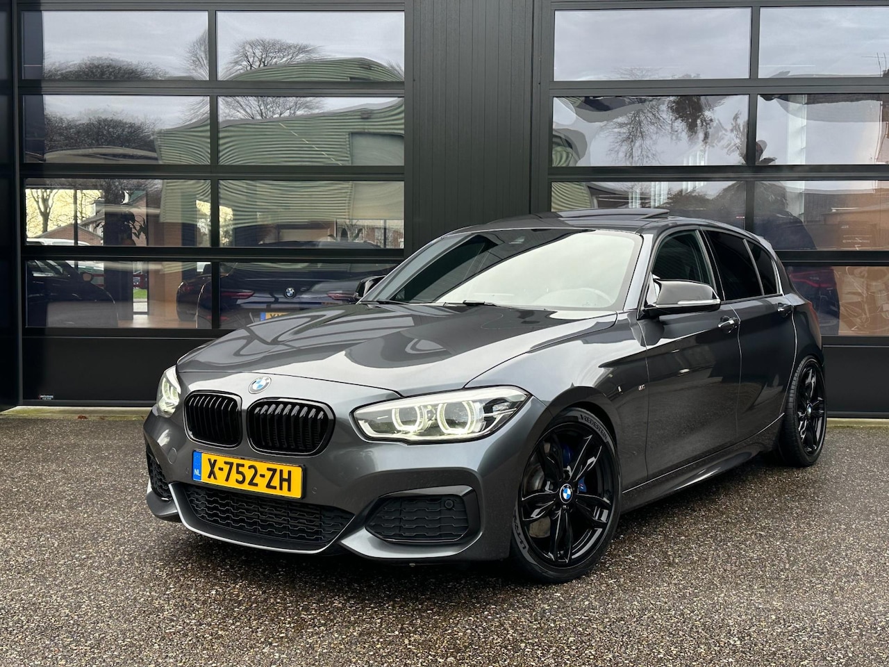 BMW 1-serie - M135i xDrive Schuifdak Camera H&K AC Schnitzer - AutoWereld.nl