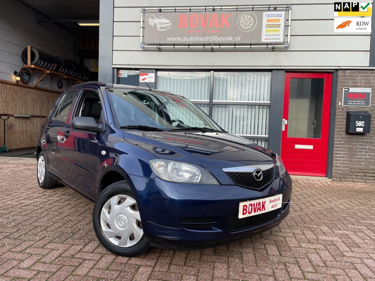 Mazda 2 - 1.4 Exclusive blue 5 deurs airco - AutoWereld.nl