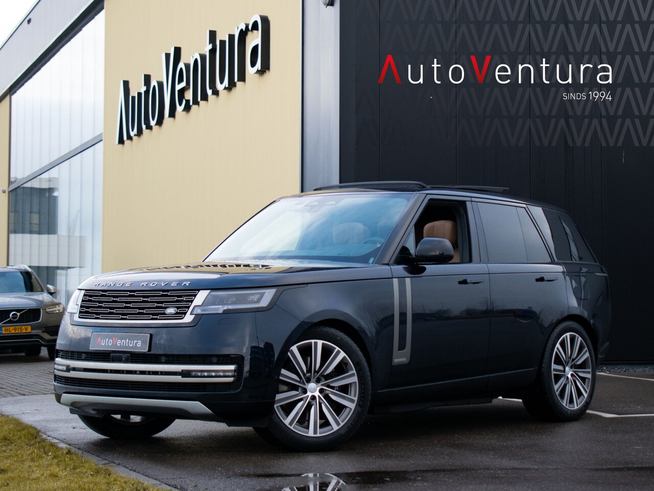 Land Rover Range Rover - 3.0 P550e Autobiography PHEV | Lounge Pack Achter | Caraway | Constellation Blue - AutoWereld.nl