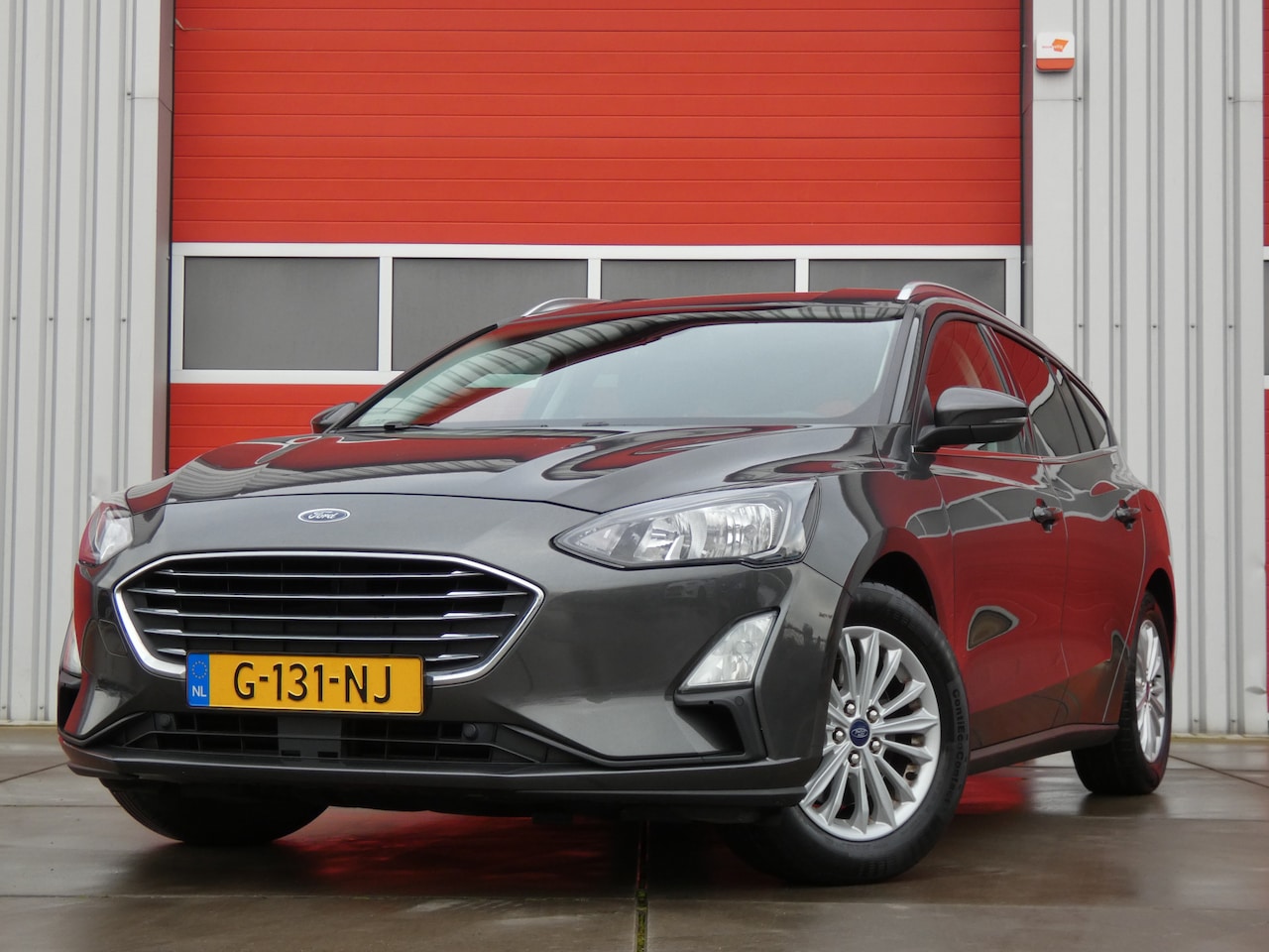 Ford Focus Wagon - 1.0 EcoBoost Titanium Business/ lage km/ zeer mooi! - AutoWereld.nl